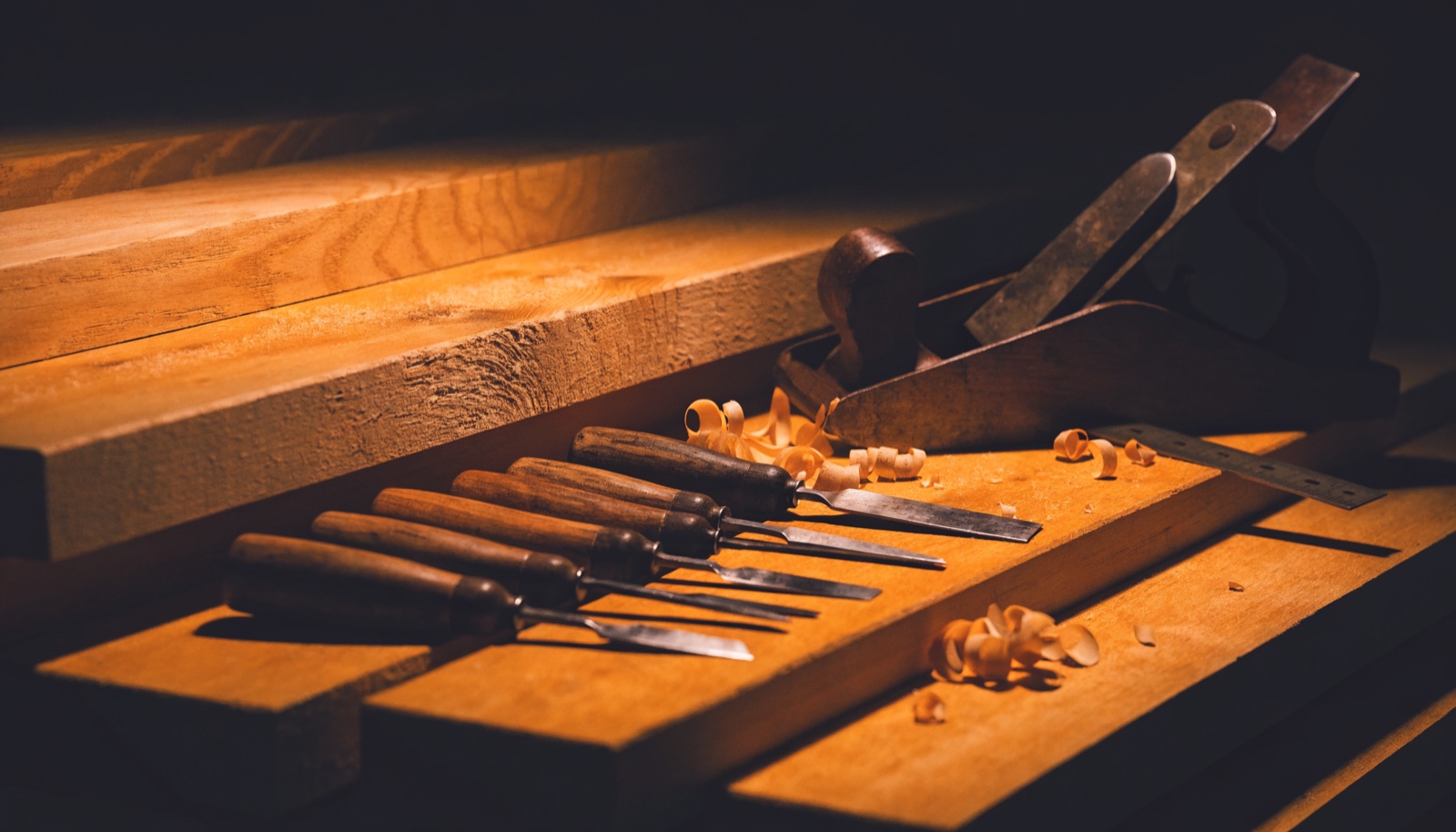 Build tools and timber laid out on a work site