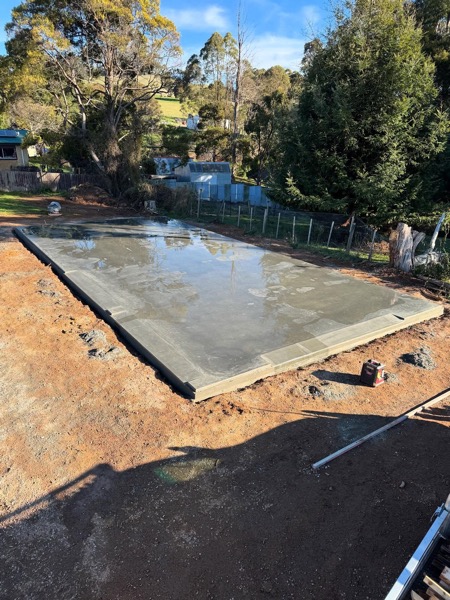 A wet-finished concrete slab by TJC Building