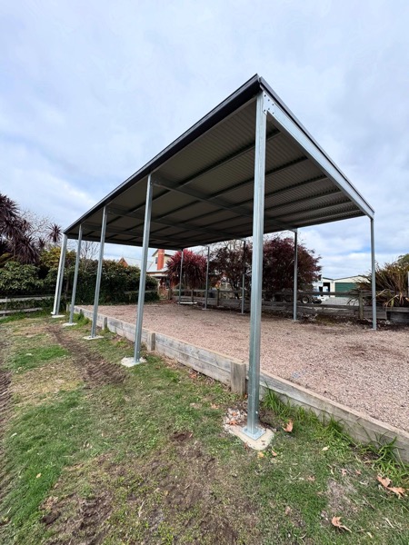 A steel shed frame erected by TJC Building on a concrete slab in North-West Tasmania